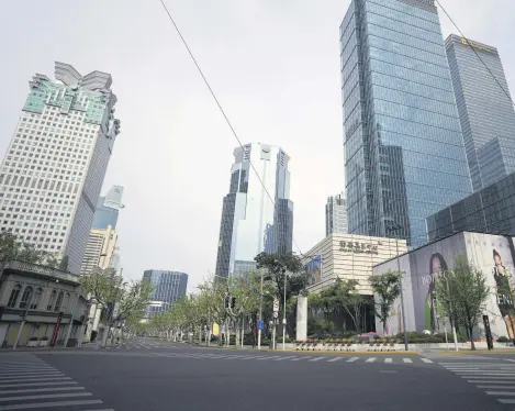  ?? ?? An empty road is seen in the Shanghai Central Business District (CBD) during a lockdown, amid the coronaviru­s pandemic, Shanghai, China, April 16, 2022.