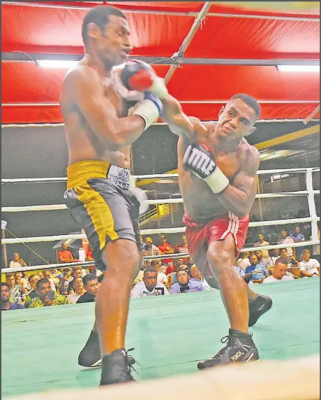  ?? Picture: REINAL CHAND ?? Alivereti Kauyaca, right, fights Savenaca Naliva during the South Pacific Boxing Promotion at Prince Charles Park in Nadi.