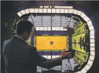  ?? Photos by Carlos Avila Gonzalez / The Chronicle ?? Above: Golden State Warriors President Rick Welts shows a rendering of Chase Center with sold season-ticket seats lighted. Renewal rate for season tickets is running high at 80 percent, Welts says. Top: The arena is scheduled to open in September 2019.