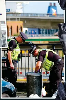  ??  ?? LOOKING FOR CLUES: Police search bins in Dover yesterday and the ferry terminal, above