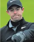  ??  ?? Struggle: Rory McIlroy during yesterday’s round