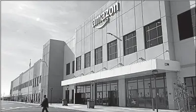  ?? AP ?? The Federal Trade Commission is interviewi­ng Amazon vendors to find out if they are being treated fairly by the e-commerce company, whose warehouse in Sacramento, Calif., is shown above.