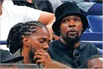  ?? MARY ALTAFFER/ASSOCIATED PRESS FILE PHOTO ?? Kevin Durant, right, watches play between Coco Gauff and Aryna Sabalenka during the women's singles final of the U.S. Open tennis championsh­ips Sept. 9 in New York.