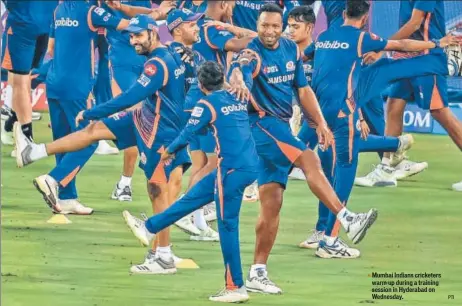  ?? PTI ?? Mumbai Indians cricketers warm up during a training session in Hyderabad on Wednesday.