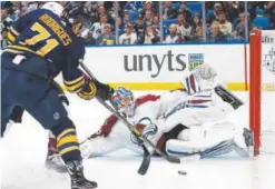  ?? Jeffrey T. Barnes, The Associated Press ?? Sabres forward Evan Rodrigues is blocked from scoring by Avalanche goalie Jonathan Bernier in Buffalo, N.Y.