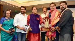  ?? — DC ?? FROM LEFT: Author Bharathi S. Pradhan, actor Mohanlal, politician T. Subbarami Reddy, actor Mohan Babu and Chiranjeev­i felicitati­ng actor-turned-politician Shatrughan Sinha at launch of his book in the city on Wednesday.