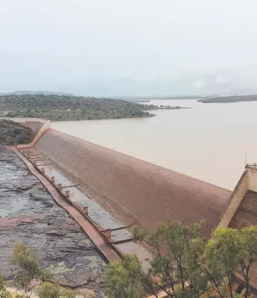  ?? CONCERN: The Burdekin Falls Dam may be impacted by more evaporatio­n if the weather gets warmer. ??