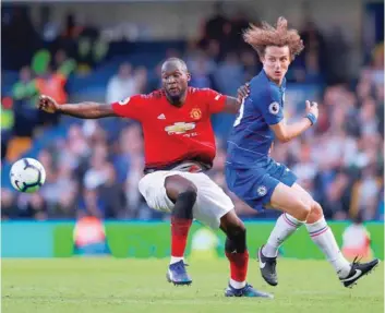  ?? — Reuters ?? Manchester United’s Romelu Lukaku in action with Chelsea’s David Luiz.