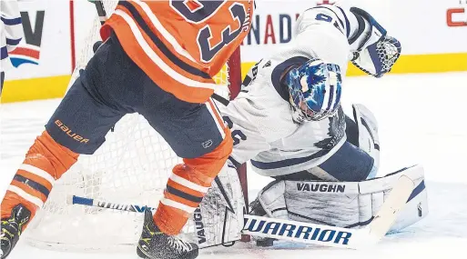  ?? JASON FRANSON THE CANADIAN PRESS ?? Leafs goalie Jack Campbell, in his first game back from a leg injury, squeezed the post to deny the Oilers’ Ryan Nugent-Hopkins in Edmonton.