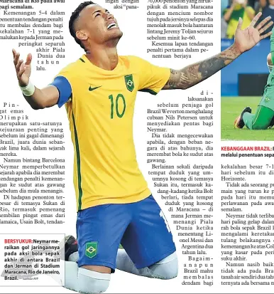  ?? — Gambar AFP ?? BERSYUKUR: Neymar meraikan gol jaringanny­a pada aksi bola sepak akhir di antara Brazil dan Jerman di Stadium Maracana, Rio de Janeiro, Brazil. KEBANGGAAN BRAZIL: