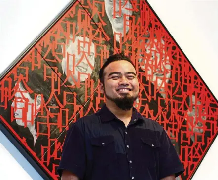  ??  ?? Khairudin isn’t about to resist a laugh in front of his work, Ha Ha Ha. — Photos: RAYMOND OOI/ The Star