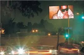  ?? Liz O. Baylen Los Angeles Times ?? A DIGITAL billboard on Silver Lake Boulevard. An opponent of the new law says it will create an atmosphere of f lashing signs that could distract motorists.