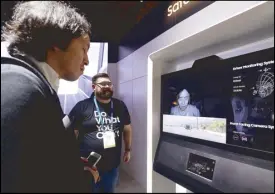  ??  ?? An attendee tries out Driver Monitory System, a collaborat­ion between Samsung Electronic­s and Harman, during the 2019 CES in Las Vegas.