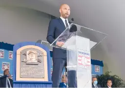  ?? HANS PENNINK/AP ?? Former Yankees shortstop and captain Derek Jeter speaks during the National Baseball Hall of Fame induction ceremony Wednesday in Cooperstow­n, New York.