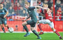  ??  ?? Manchester City's Kevin De Bruyne controls the ball against Bristol City during the English League Cup semi-final, second leg match at Ashton Gate Stadium in Bristol.