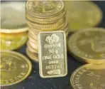  ?? — Reuters ?? Gold bullion is displayed at Hatton Garden Metals precious metal dealers in London, Britain.