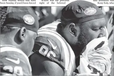  ?? UPI; AP ?? SEE NO EVIL: Muhammad Wilkerson (above) can’t bear to watch Marshawn Lynch (right) and the Raiders beat up on the Jets on Sunday. Whereas fans in 1968 were forced to watch the television movie “Heidi”, today’s fans would welcome such a diversion from...