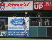  ?? SCOTT KANE — THE ASSOCIATED PRESS ?? San Francisco Giants right fielder Luis Gonzalez (51) is unable to catch a solo home run hit by St. Louis Cardinals' Tommy Edman during the fifth inning of a baseball game Saturday in St. Louis.