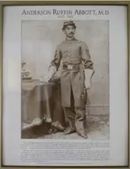  ??  ?? A picture of Catherine Slaney’s great-grandfathe­r, Anderson Ruffin Abbott, hangs at her home in Georgetown, Ont.