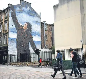  ?? Picture: Getty Images. ?? A mural of Billy Connolly in Glasgow’s Dixon Street.