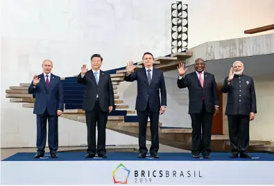  ??  ?? The BRICS leaders pose for a group photo at the 11th summit of BRICS in Brasilia, Brazil, on November 14, 2019. Brazilian President Jair Bolsonaro presided over the summit. Chinese President Xi Jinping, Russian President Vladimir Putin, Indian Prime Minister Narendra Modi, and South African President Cyril Ramaphosa attended the summit.