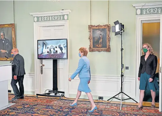  ??  ?? DIVIDING OPINIONS: Patrick Harvie, First Minister Nicola Sturgeon and Lorna Slater at Bute House in Edinburgh.