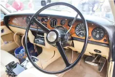  ??  ?? If ever you have wanted to look inside a Roller, this is your opportunit­y, and yes, it is every bit as luxurious as you imagine. Beautiful cream-leather seats and real wood panelling on the dashboard, make you imagine what it would be like to sit on a...