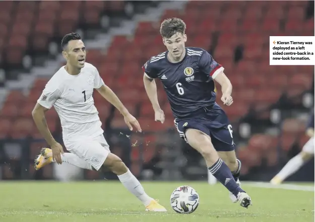  ?? PICTURE: ANDREW MILLIGAN/ PA ?? 2 Kieran Tierney was deployed as a left sided centre- back in a new- look formation.