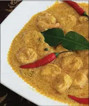  ??  ?? Using canned curry powder, instead of the designated spices, will overpower the delicate flavor nuances of this coconut shrimp curry. The few peppercorn­s used add to this fragrance medley, and soften in the cooking process.