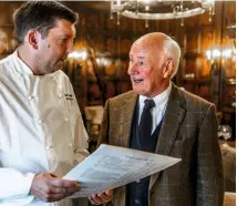  ??  ?? Head chef Paul Reseigh and hotel owner Lawrence Hoskins discuss the menu.