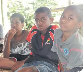  ??  ?? Children of Naceva Village on Beqa Island listening attentivel­y.