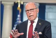  ?? aP-evan Vucci ?? White House chief economic adviser Larry Kudlow talks with reporters about the impact of the Coronaviru­s on markets in the Brady Press Briefing Room of the White House, Friday in Washington.