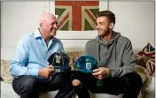  ??  ?? CAP THAT: Angus Gunn with his dad, former Scotland goalkeeper Bryan