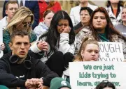  ?? AP ?? Current and former Michigan State University students rally at the capitol in Lansing on Wednesday, two days after a mass shooting on campus killed three.