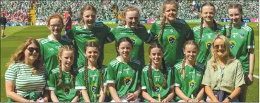  ?? (Pic: Tom Fox) ?? LIMERICK LADIES - Primary Games camogie representa­tives from the Treaty County, who took on their Cork counterpar­ts at half-time in Limerick on Sunday. The side included Ciara Murphy from Ballylande­rs NS (No 7 - front centre).