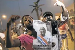  ?? Picture: AFP ?? CHANGING TIMES: Gambia’s citizens celebrate the inaugurati­on of Gambia’s new President Adama Barrow at after he was sworn in at the Gambian embassy in Dakar. RIGHT: Timeline of Gambia’s push to usher in a new era