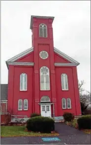  ?? SUBMITTED PHOTO ?? A comparison in religious worship quarters of Pennsylvan­ia Dutch cousins between a simpler Plain Dutch Mennonite meetinghou­se versus an extravagan­t brick Worldly Dutch historic church built in 1822, which traces its Reformed worship beginnings to 1736.