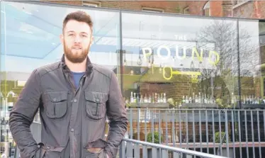  ??  ?? The Pound’s co-owner Stephen Allen at the new bridge over the Stour