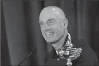  ?? The Associated Press ?? HIGH SPIRITS: U.S. Ryder Cup team captain Jim Furyk smiles during a new conference in West Conshohock­e, Pa., on Sept. 4. The 42nd Ryder Cup matches will be held in France from Sept. 28-30 at the Albatros Course of Le Golf National.