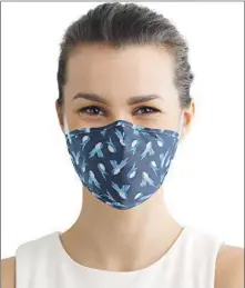  ??  ?? Face masks have become ubiquitous during the pandemic but do little for communicat­ion.