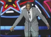  ?? Associated Press ?? Ravens QB Lamar Jackson speaks after winning AP Most Valuable Player during the NFL Honors award show on Thursday in Las Vegas.