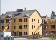  ?? Brian A. Pounds / Hearst Connecticu­t Media ?? The new Windward Commons apartments under constructi­on on the site of the former Marina Village public housing project in Bridgeport on Tuesday.