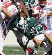  ?? KIRTHMON F. DOZIER / DETROIT FREE PRESS FILE ?? “You just can’t keep doing the same thing. The guys we have here, I thinkwe’re good guys. We knowwhat’s right fromwrong,” says Spartans running back LJ Scott.