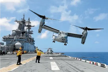  ?? PHOTO: REUTERS ?? A Marine Corps MV-22B Osprey takes off from the USS Kearsarge aircraft carrier as US military continues to evacuate personnel from the US Virgin Islands in advance of Hurricane Maria.