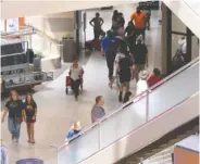  ?? STAFF FILE PHOTO BY MATT HAMILTON ?? Shoppers are seen at Hamilton Place mall.