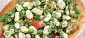  ??  ?? 1 A dish of fava bean tabbouleh from a recipe by Melissa d’Arabian. Place the beans, herbs,
tomato and shallot in a large bowl. In a small bowl, whisk together the dressing ingredient­s, and pour onto the salad and toss. Will keep for up to 24 hours in...