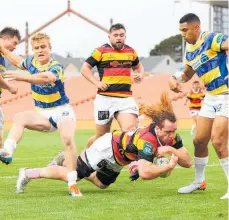  ?? Photo / Getty Images ?? Patrick McCurran scores the deciding try for Waikato.