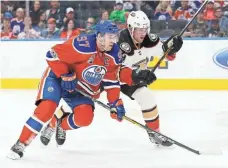  ?? PERRY NELSON, USA TODAY SPORTS ?? Connor McDavid, left, appears to have the scoring title wrapped up, which bodes well for his Hart Trophy chances.