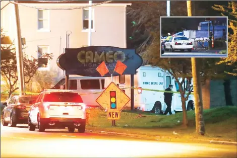  ??  ?? Police operate at a crime scene outside the Cameo Nightclub after a reported fatal shooting on March 26, in Cincinnati. (Inset): A body is removed as police operate at a crime scene outside the Cameo club. (AP)