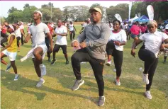  ?? — Picture: Kudakwashe Hunda ?? Zimpapers Chief Executive Officer Mr Pikirayi Deketeke, flanked by brothers Devine (left) and Tinashe Matanhire (second from left), Nyasha Kapungu (second from right) and Ruvimbo Kawondera (right), leads participan­ts in a Zumba dance at Old Hararians Sports Club after a 10km cancer power walk in Harare yesterday.